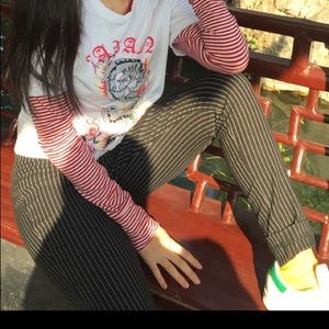 tight skinny fitting pinstriped blank white pants